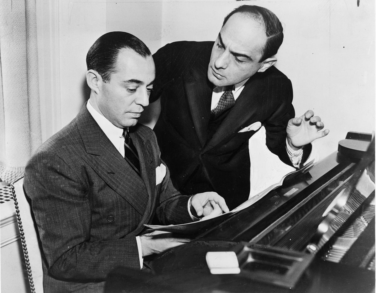 Richard Rodgers and Lorenz Hart compose at the piano.