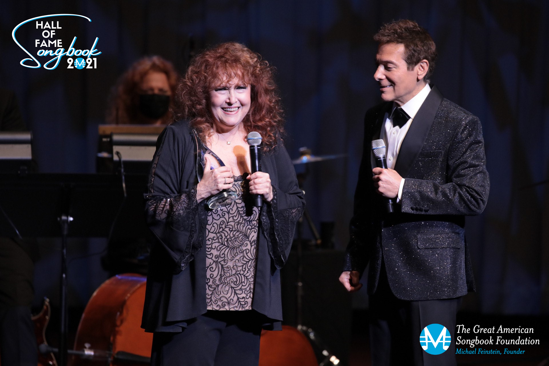 Melissa Manchester smiles as she accepts the New Standard Award from Michael Feinstein