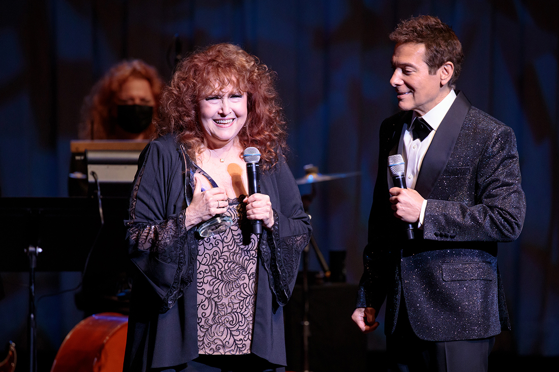 Melissa Manchester receives the Songbook Hall of Fame award from Michael Feinstein onstage.