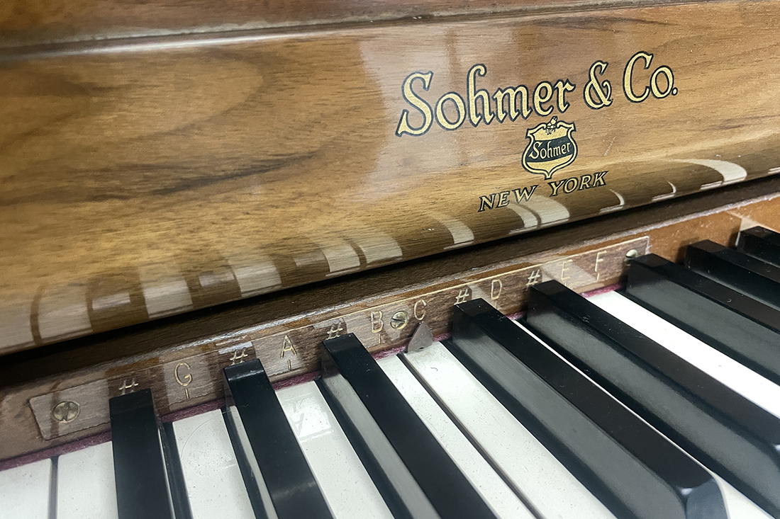 Closeup of a Sohmer brand piano keyboard